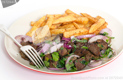 Image of Albanian liver meal with fork