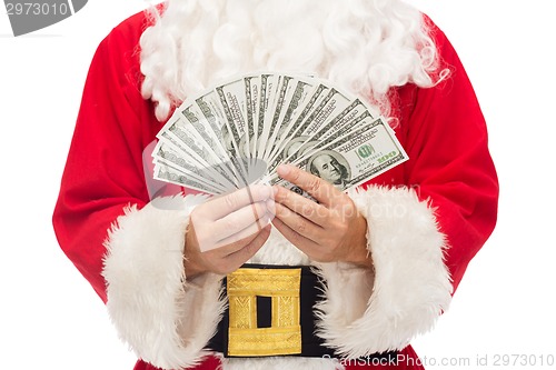 Image of close up of santa claus with dollar money