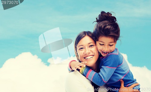 Image of hugging mother and daughter