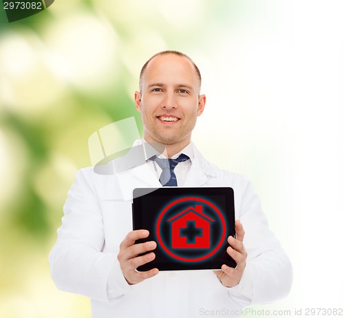 Image of smiling male doctor with tablet pc