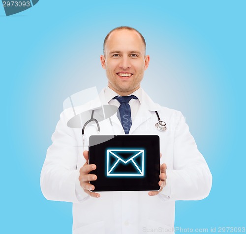 Image of smiling male doctor with stethoscope and tablet pc