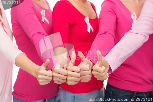 Image of close up of women with cancer awareness ribbons