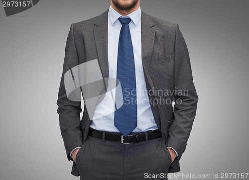 Image of close up of businessman over gray background