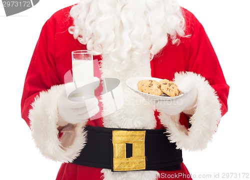 Image of close up of santa claus with milk and cookies