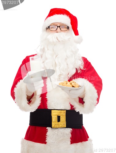 Image of santa claus with glass of milk and cookies