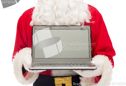 Image of close up of santa claus with laptop