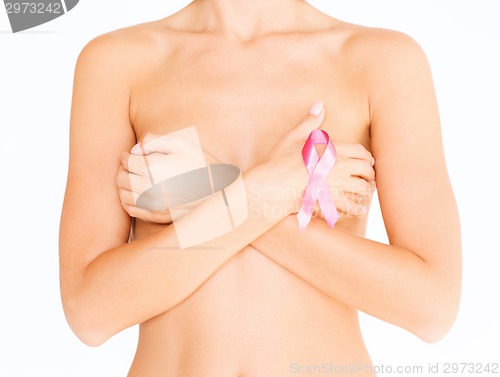 Image of naked woman with breast cancer awareness ribbon