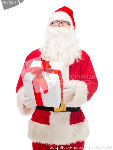 Image of man in costume of santa claus with gift box