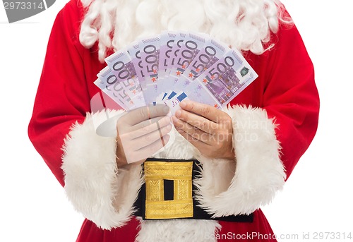 Image of close up of santa claus with euro money