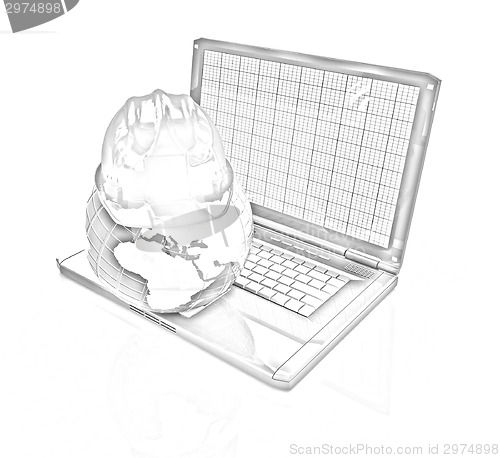 Image of Hard hat and earth on a laptop 