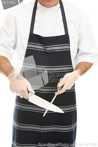 Image of Butcher sharpening a knife