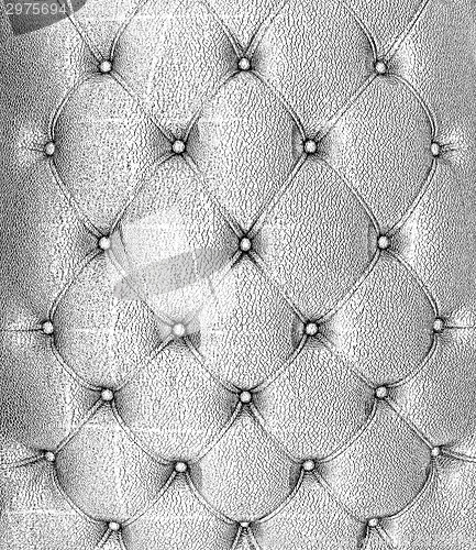 Image of Sepia picture of genuine black leather upholstery 