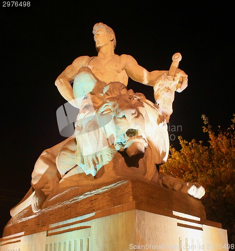 Image of Man defeating lion  