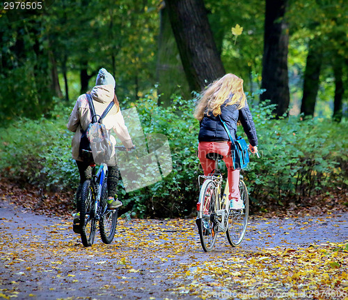 Image of Young couple with bicycles 