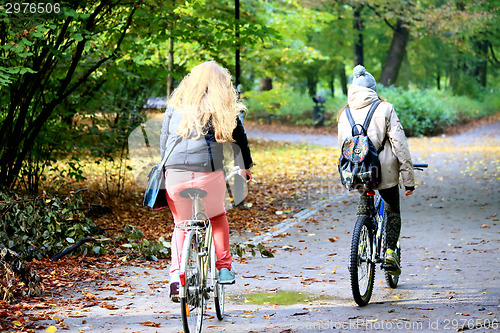 Image of Young couple with bicycles 