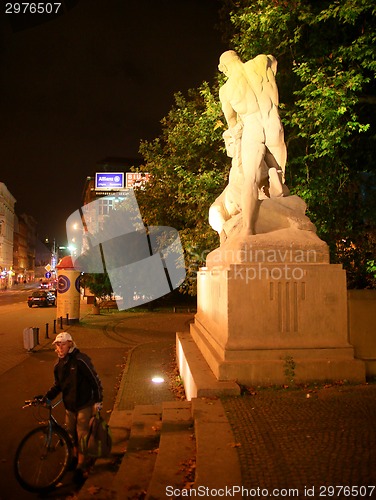 Image of Man defeating lion  