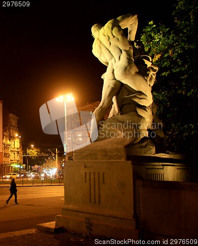 Image of Man defeating lion  