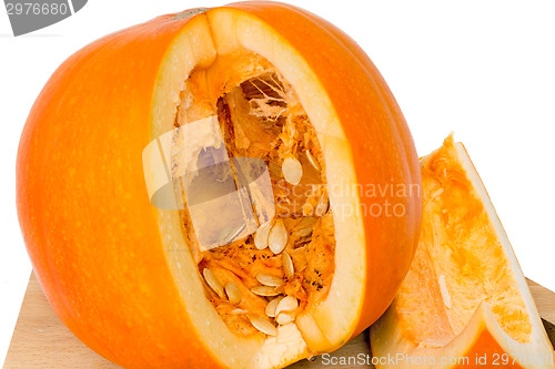 Image of Ripe cut the pumpkin on a white background. 