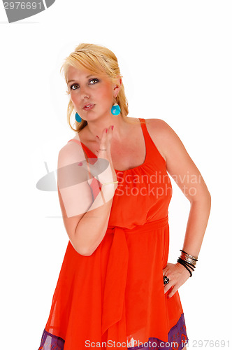 Image of Woman posing in red dress.