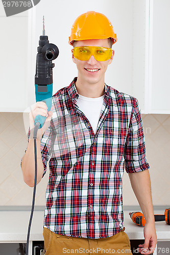 Image of worker with perforator