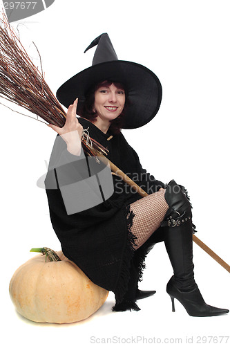 Image of Pretty witch sitting