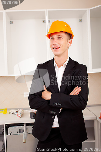 Image of smiling engineer in the interior