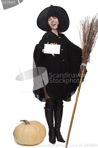 Image of Witch holding a card