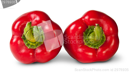 Image of Two Red Bell Peppers Lying Beside