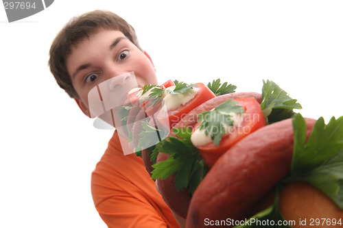 Image of Boy eating crazy sandwich