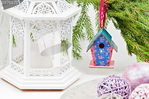 Image of Christmas toy birdhouses and other decorations