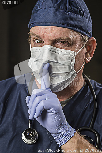Image of Secretive Doctor Wearing Protective Head Wear
