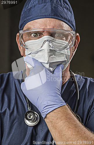 Image of Determined Looking Doctor or Nurse with Protective Wear and Stet