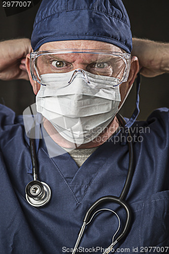 Image of Determined Looking Doctor or Nurse with Protective Wear and Stet