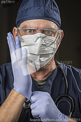 Image of Determined Looking Doctor or Nurse with Protective Wear and Stet