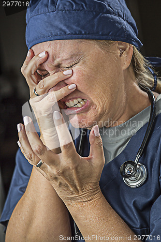 Image of Agonizing Crying Female Doctor or Nurse