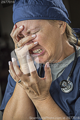 Image of Agonizing Crying Female Doctor or Nurse