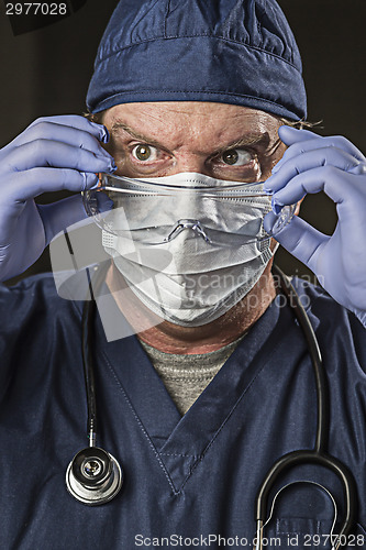 Image of Determined Looking Doctor or Nurse with Protective Wear and Stet