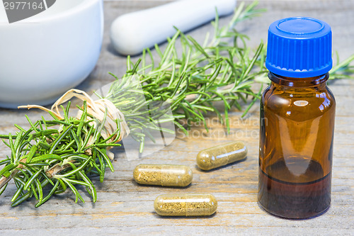 Image of rosemary with mortar