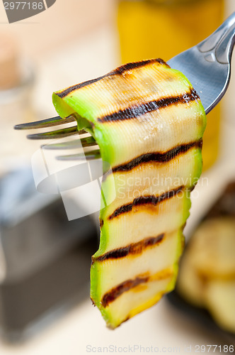 Image of grilled zucchini courgette on a fork