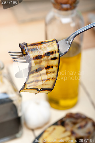 Image of grilled eggplant oubergine on a fork