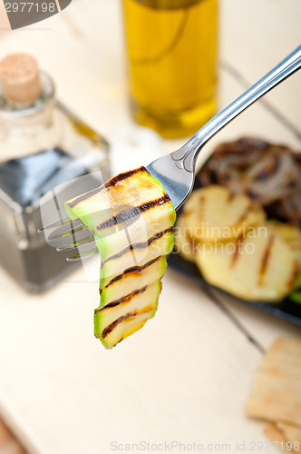 Image of grilled zucchini courgette on a fork