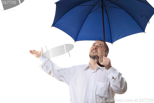 Image of Man under blue umbrella