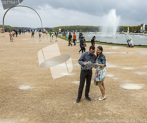 Image of Couple Visiting a French Garden