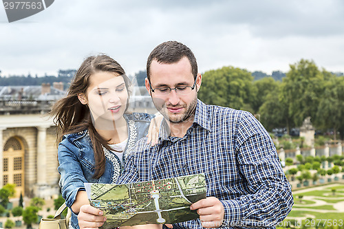 Image of Young Couple Looking in a Map