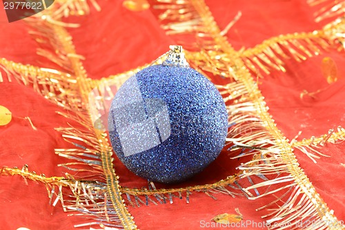 Image of Christmas background with blue new year ball