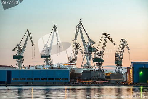 Image of Industrial cargo cranes in the dock