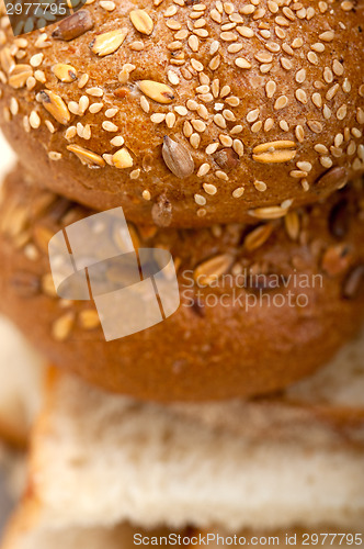 Image of organic bread over rustic table