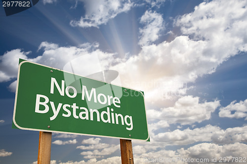 Image of No More Bystanding Green Road Sign