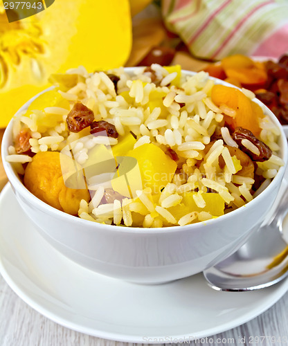Image of Pilaf fruit with pumpkin on board