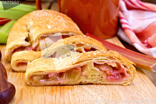 Image of Strudel with rhubarb and mug on board